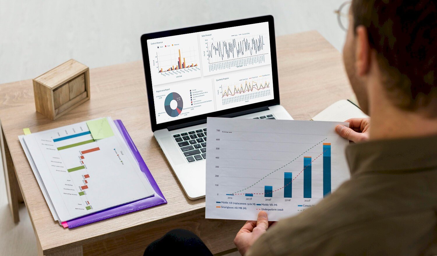 Courier company manager tracking live shipment data and delivery routes on a real-time logistics dashboard.